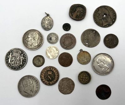 a lot of coins that are on the table