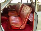 a red seat in the back of a car
