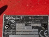 a close up of a label on a red machine