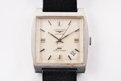 an image of a wrist watch with a white dial and black leather strap