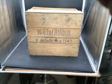 a wooden box that is sitting in the middle of a table
