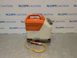 an orange and white machine sitting on top of a table