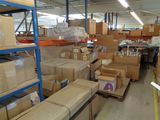 many boxes and boxes on the shelves in the warehouse