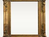 an antique gold frame on a white background with a white background