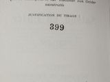 an open book with a black and white image of a clock
