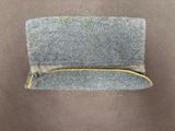 a close up of a hat with a zipper on it