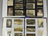an open book with a bunch of old photos on it