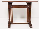 an image of a wooden table with two legs and a table top