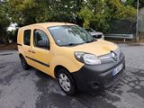 yellow and black van parked on the side of the road