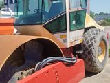 a picture of a large construction vehicle parked in a lot
