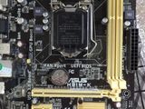 a close up of a motherboard with a cpu on top of it