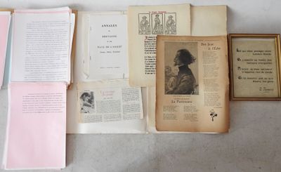 many old books on the table with pictures on them