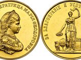 une pièce d'or représentant une femme tenant une cruche