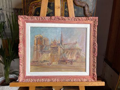 a picture of a painting on a easel in a room