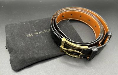 black and tan leather belt with gold buckle and black pouch
