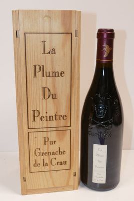 wooden box with a bottle of wine and a wooden box with a bottle of wine on it