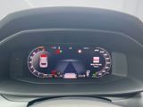 the dashboard of a car with a digital display in the center