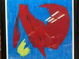 a picture of a picture of a red bird on a blue background