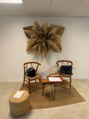 a room with two chairs and a table in it
