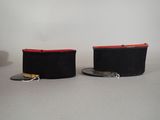two hats that are sitting on top of each other