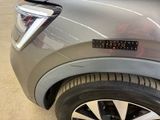a close up of a car with a sticker on the side of it
