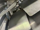a close up of a metal object with a propeller on it
