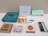 many different boxes of chocolates on a white table