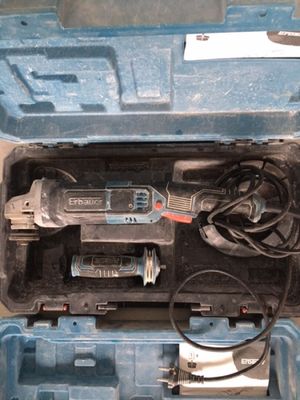 a blue tool box with tools inside of it