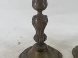 two candles that are sitting on a table