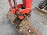 a close up of a fork and a fork attachment on a construction site