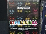 two boxes with different designs on them on a black surface