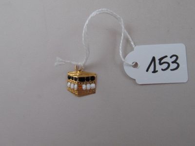 a small ornament hanging from a string with a price tag