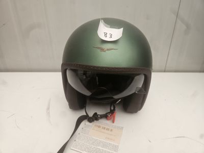 a helmet with a tag on it sitting on a table