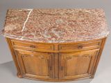 a marble top on a wooden cabinet with drawers