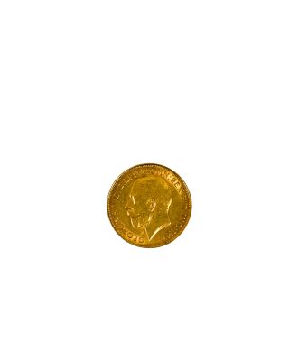 gros plan d'une pièce d'or sur fond blanc