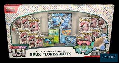 the box contains a collection of pokemon cards and other collectibles