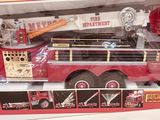 a toy fire truck in the box on the table