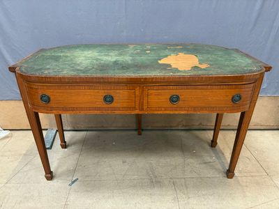 Bureau rectangulaire aux côtés arrondis en bois naturel et m…