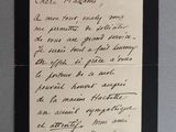 une vieille lettre manuscrite sur une feuille de papier comportant des inscriptions