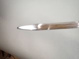 a knife that is sitting on top of a table