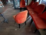 many chairs that are sitting in the corner of the room