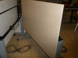 a white table with a white top and a black frame