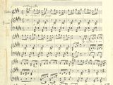 une image en noir et blanc représentant une partition avec des notes de musique