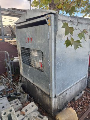 an old refrigerator that is sitting on the ground
