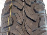a close up of a tire on a white surface