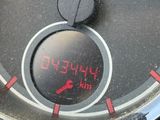 a close up of a speedometer on a motorcycle