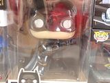 a box of batman pop vinyl figures on display