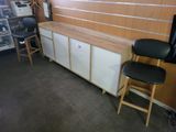 two chairs that are sitting in front of a tv
