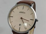 a close up of a watch on display on a table