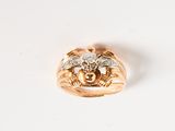 an image of a gold ring with a heart shaped diamond